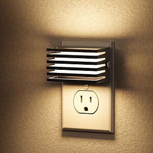 Two small rectangular LED wall plug night lights with adjustable brightness, featuring integrated light sensors for automatic ambient detection.