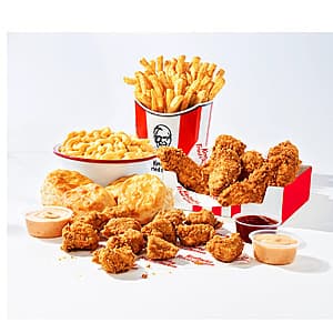KFC Popcorn Chicken Big Box meal with popcorn chicken, two tenders, fries, medium drink, dipping sauces, and chocolate chunk cookie.