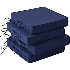 Set of four navy blue outdoor patio cushions, each 19" x 19" x 3", with handles and ties for securing to chairs.
