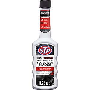 STP automotive fuel treatment products including bottles of fuel injector cleaner, octane booster, and gas treatment.