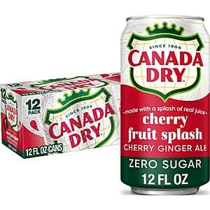 Three cans of Canada Dry Zero Sugar Cherry Ginger Ale Fruit Splash with cherry-themed packaging.