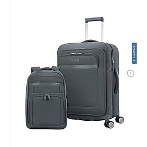 Slate blue Samson Stackit luggage with dual spinner wheels and stackable carry-on strap design.