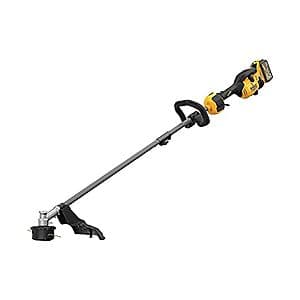 DEWALT DCST972X1 60V cordless string trimmer with battery and charger in kit box.