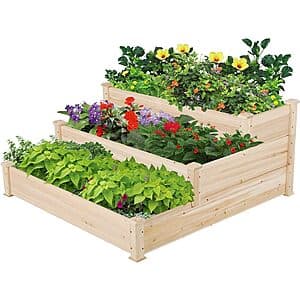 Yaheetech 47-inch wooden raised garden bed with three tiers in natural fir wood, showing stacked planting levels for vegetables, flowers, and herbs.
