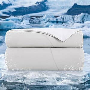 Light grey Topcee queen-size cooling comforter with silk filling in packaging.