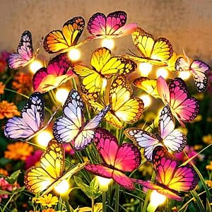 2-pack of solar-powered garden stake lights featuring colorful swaying butterflies and LED orbs for outdoor garden decoration.