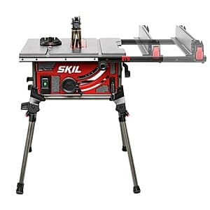 Skilsaw TS6307-00-FS corded jobsite table saw with 10-inch blade, gray and red frame, mounted on a flat base.