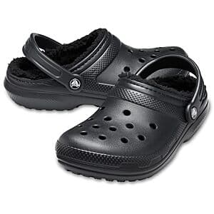 Black Crocs Unisex Adult Classic Lined Clog with cushioned sole and ventilation holes.