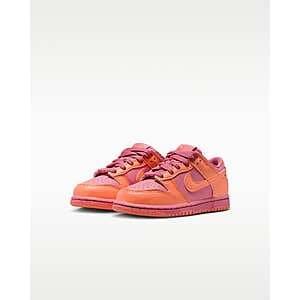 Nike Big Kids' Dunk Low shoes in classic basketball silhouette, available in 2 color options, displayed for sizes 3.5–7Y.