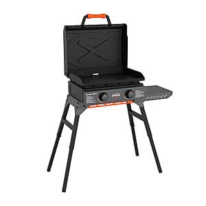 Gray Blackstone Adventure Ready 2-burner propane flat top griddle with hood and stand.