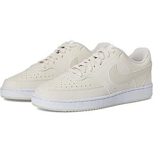 Nike Women's Court Vision Low Sneakers in light orewood brown and white colorway.