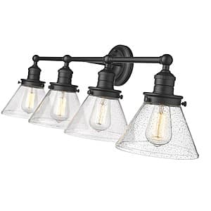 Matte black metal 35-inch wide vanity fixture with four seedy glass shades and medium base socket openings.