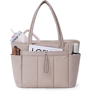 Beige puffy quilted tote bag with integrated 15.6" laptop compartment and carrying handles.