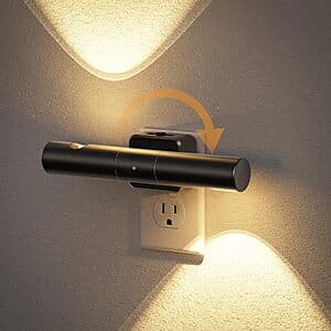 Black JandCase LED plug-in night light with dimmable 3000K warm light, featuring a 330° rotatable head and 180° rotating plug.