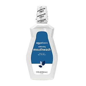 Amazon Basics Alcohol-Free Whitening Mouthwash 32-oz bottle in Clean Mint with white label on blue background.