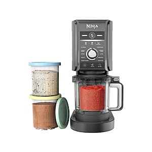Ninja CREAMi Deluxe 11-in-1 refurbished ice cream maker with control panel and frozen treat preparation attachment.
