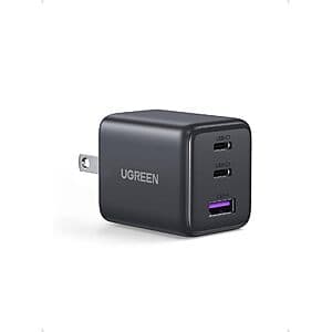 UGREEN USB-C hub with silver metal casing, featuring four USB 3.0 ports, HDMI output, and built-in SD/TF card reader slots.