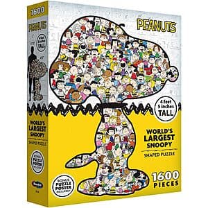 Snoopy-shaped jigsaw puzzle box artwork featuring a beagle character in black and white, indicating 1600 interlocking pieces.