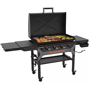 36-inch omnivore with integrated hood in neutral tones.