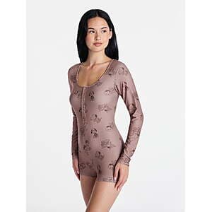 Chocolate malt Peanuts Snoopy women's one-piece sleep romper displayed flat or on a model, available in sizes XS to 3X.