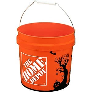Orange plastic 2-gallon Halloween bucket with handles, featuring festive holiday design.