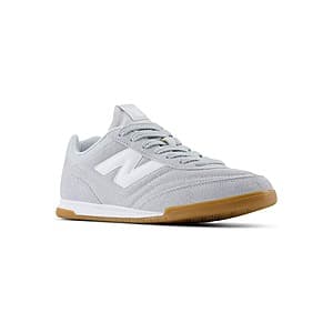 Women's New Balance RC42 athletic sneaker in brown colorway with classic lace-up design.