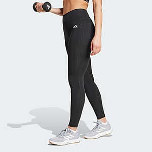 Black full-length adidas Optimé Essentials leggings with stash pockets for women.