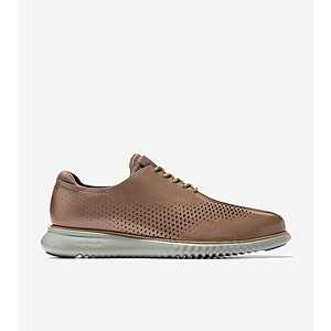 Cole Haan Men's 2.ZERØGRAND Laser Wingtip Oxfords in black leather with classic wingtip detailing and lace-up closure.