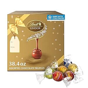 Box of Lindt LINDOR assorted chocolate truffles showing colorful foil-wrapped candies, 38.4 oz / 90 count package.