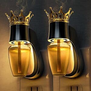 Two LOHAS LED plug-in fragrance diffusers with wax melt warmers and night light function in compact design.