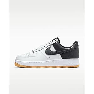 Nike Men's Air Force 1 '07 LV8 sneaker in Summit White, Metallic Silver, and Black colorway, shown from the side.