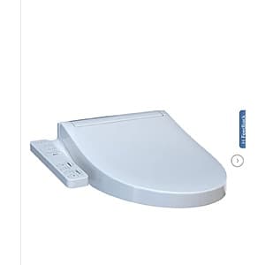 TOTO heated toilet seat with integrated control panel on the side, featuring adjustable water spray settings and warm air drying function.