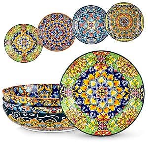 Four large cream-colored ceramic pasta bowls with a simple matte finish, each 42 ounces in capacity.