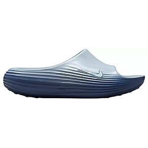 Blue Nike Women's Reactx Rejuven8 Slides with cushioned sole and Nike branding on the footbed.