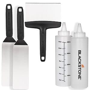 Blackstone stainless steel 5-piece griddle toolkit featuring spatulas, liquid bottles, and a scraper for griddle cooking and maintenance.