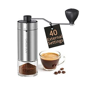 Silver CIRCLE JOY mini manual coffee grinder with external adjustment settings dial.
