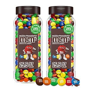 Two clear resealable jars filled with M&M's milk chocolate candies in assorted colors.