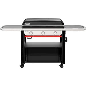 Weber Spirit E-310 stainless steel 3-burner propane gas grill with control knobs and cooking grates.