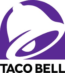 Taco Bell meal featuring a Crunchwrap Slider, Crunchy Taco, Mexican Pizza, and Soft Taco with fountain drinks.