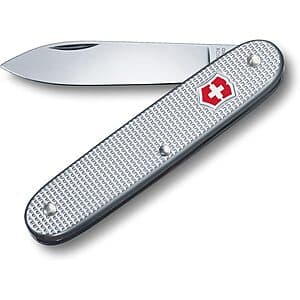 Silver Victorinox Swiss Army Classic Alox pocket knife with closed stainless steel blade and Alox scales, showing compact folded design.