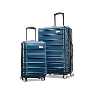 Two-piece Samsonite Omni 2 hardside spinner luggage set featuring a medium suitcase and matching carry-on bag with telescoping handles and four-wheel spinners.