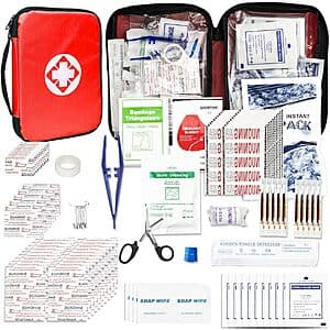 Compact travel-size first aid kit bag with waterproof plastic compartments containing 300 essential medical supplies including bandages, gauze, ice packs, and scissors.