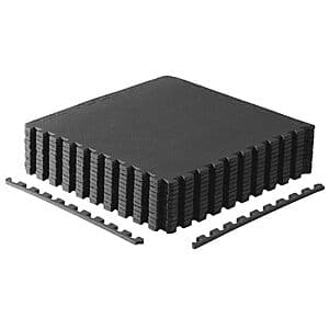 12-piece set of black interlocking EVA foam exercise mat tiles, each 24 inches square with 1/2-inch thickness, assembled in puzzle formation.