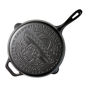 Victoria 12-inch cast iron skillet with Day of the Dead La Calaca skull design in black with colorful decorative accents.