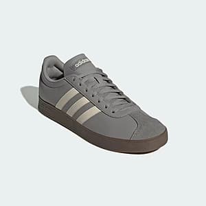 Grey adidas VL Court Base men's lace-up sneaker with synthetic leather upper and T-toe design, shown in Charcoal Solid Grey and Alumina colorway.