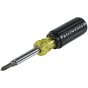 Klein Tools 5-In-1 Multi-Bit Screwdriver with black handle showing five interchangeable tips including slotted, Phillips, and nut driver bits.