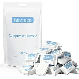50-pack of individually wrapped compressed towel tablets in waterproof cases, pocket-sized before expanding.