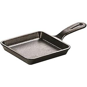 Lodge 5-inch black cast iron square skillet with pre-seasoned finish and handle.