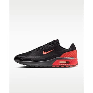 Nike Men's Air Max Bia shoe in black with iron grey, orange frost, and turf orange accents.