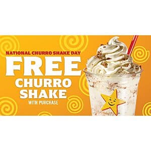 Regular-size hand-scooped churro shake in a clear cup with whipped cream and churro toppings.